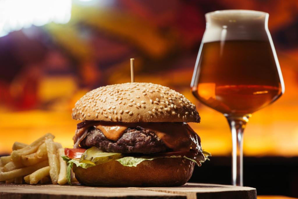 Hamburger, french fries and a glass of beer